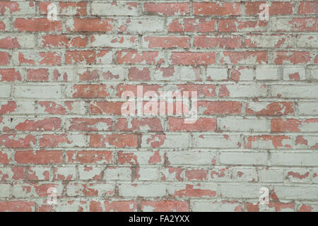 Grunge background image of worn painted brick wall Stock Photo