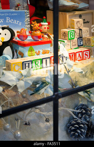 Christmas toy shop window display. Broadway, Cotswolds, England Stock Photo