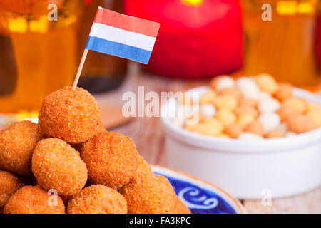 'Bittergarnituur' - Dutch deep fried snacks, usually enjoyed at the end of the afternoon with a couple of drinks, in company of Stock Photo