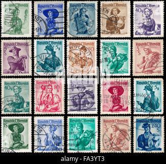 AUSTRIA - CIRCA 1948: stamps printed in Austria, show women in national dress Stock Photo