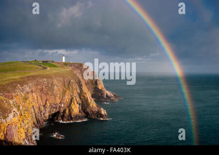 Rainbow over the Mull of Galloway lighthouse, Dumfries and Galloway, Scotland, UK Stock Photo