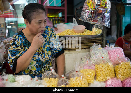 Market stall and street food being prepared in Chinatown Bangkok, Thailand. Yaowarat, Bangkok’s Chinatown, is the World’s most r Stock Photo