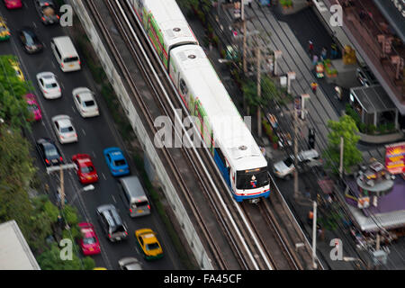 Aerial view of the sky train BTS in Sukhumvit. Skytrain BTS train en route over Sukhumvit in Bangkok city centre Thailand Stock Photo