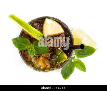 Cuba Libre Longdrink with brown rum and lime (isolated on white background) Stock Photo