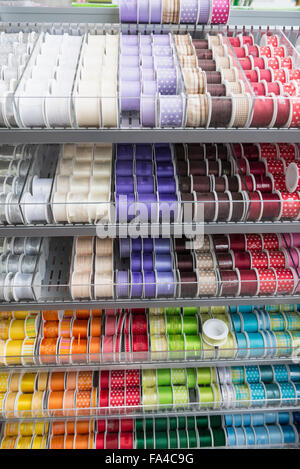Multicolor ribbons  for sale on store shelves, Augsburg, Bavaria, Germany Stock Photo