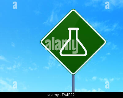 Science concept: Flask on road sign background Stock Photo - Alamy