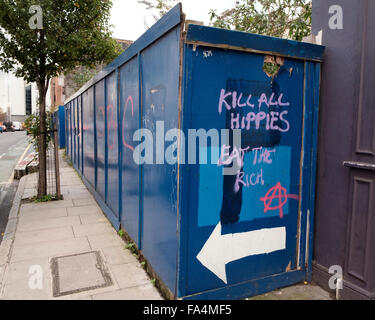 Leman Street, London, 25 November 2015: Kill all hippies, Eat the rich - Anti-Hipster slogan near Aldgate Stock Photo