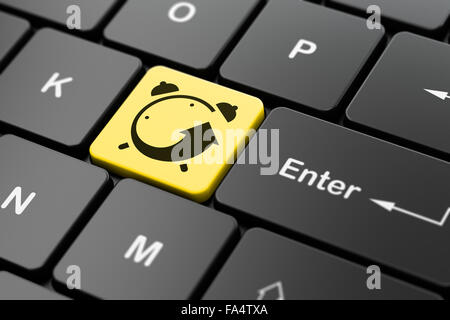 Time concept: Alarm Clock on computer keyboard background Stock Photo