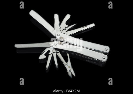 Stainless steel army knife multitool isolated on black Stock Photo