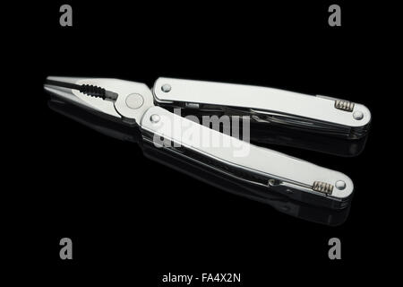 Stainless steel army knife multi-tool isolated on black Stock Photo