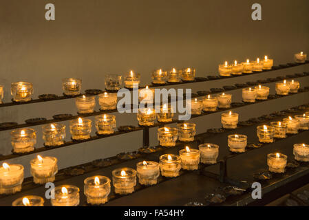 Burning candles in church, Carinthia, Austria Stock Photo