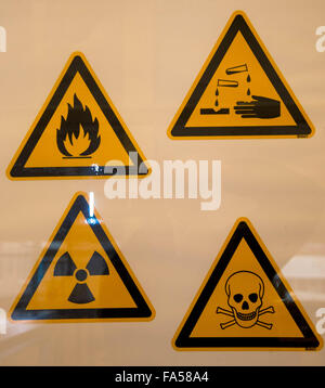 yellow warning signs in science classroom at highschool Stock Photo