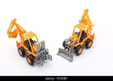 Orange tractor toy construction on white background Stock Photo