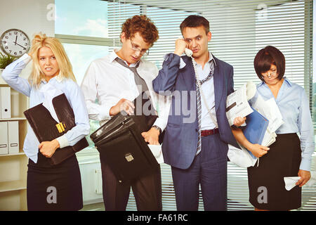 Messy white collar workers being confused after briefing Stock Photo