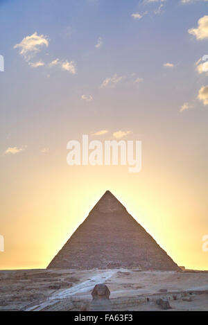 Sunset, Sphinx (foreground), The Pyramid of Chephren (background), The Pyramids of Giza, UNESCO World Heritage Site, Giza, Egypt