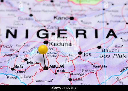 Abuja pinned on a map of Africa Stock Photo