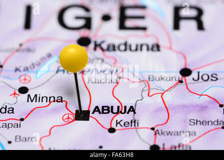 Abuja pinned on a map of Africa Stock Photo