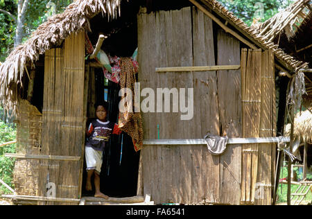 Orang Asli tribe in Taman Negara National Park in central Malaysia. Typical hutsin the village. Stock Photo