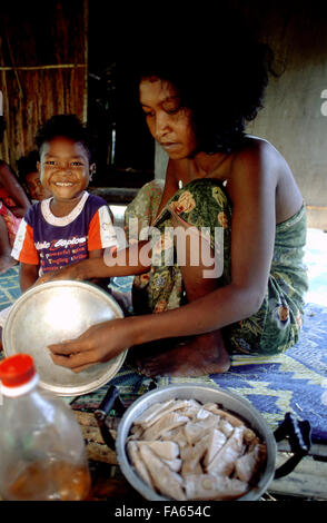 Orang Asli tribe in Taman Negara National Park in central Malaysia. Mother with his son. Stock Photo