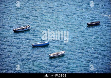 Aerial view of small fishing boat at sea, Greece. Stock Photo by nblxer