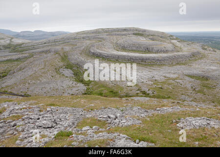 Eroded limestone hills in the Burren on the Mullaghmore Loop walk - County Clare, Ireland Stock Photo