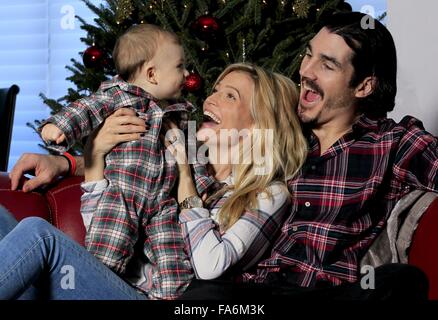 Tampa, Florida, USA. 19th Dec, 2015. DIRK SHADD | Times .Tampa Bay Lightning forward Brian Boyle with wife his wife Lauren, both 31, and their new baby Declan, 7 months old, at their home in the Channelside neighborhood of Tampa on Saturday (12/19/15). The couple had Declan, their first child, in the middle of the Lightning playoff run last spring. © Dirk Shadd/Tampa Bay Times/ZUMA Wire/Alamy Live News Stock Photo