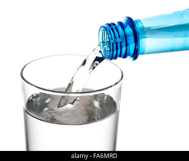 Sparkling water being poured into drinking glass Stock Photo