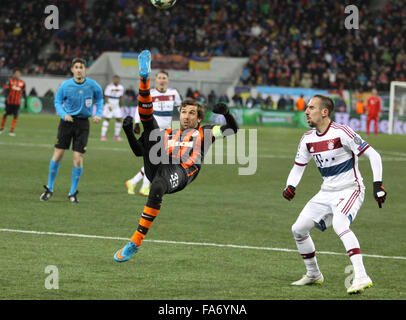 LVIV, UKRAINE - FEBRUARY 17, 2015: Darijo Srna of Shakhtar Donetsk (L) fights for a ball with Franck Ribery of Bayern Munich during their UEFA Champions League game at Arena Lviv stadium Stock Photo