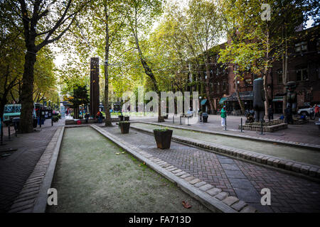 Occidental Park is in the heart of the historic Pioneer Square district Stock Photo