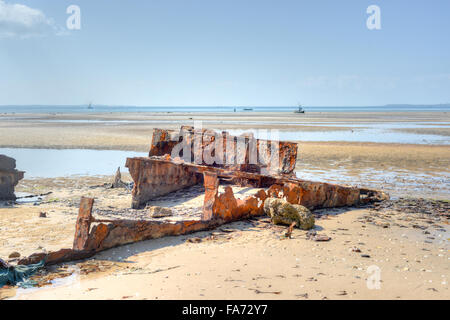 Panoramic View of Vilanculos Beach in Mozambique during low tide. One can see the various dhows resting in the sand. Stock Photo