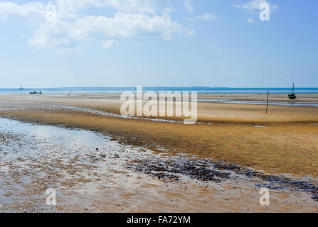 Panoramic View of Vilanculos Beach in Mozambique during low tide. One can see the various dhows resting in the sand. Stock Photo