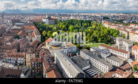 Panoramic view over the city center and Giardini Reali, the royal gardens of Torino/Turin, Piedmont, Italy. In the background the royal palace. Stock Photo