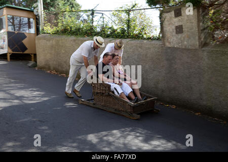 Wicker Toboggan Sled Ride in Monte,Funchal, madeira which has been traditional for over 100 years Stock Photo