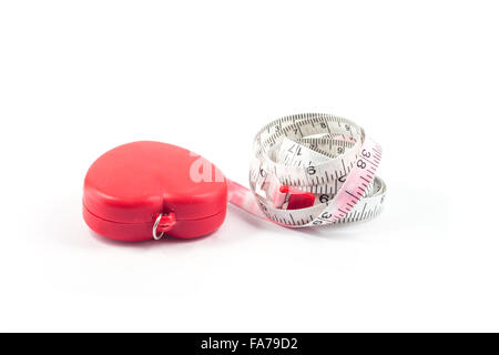 Measuring tape in heart shape on white background, stock photo Stock Photo