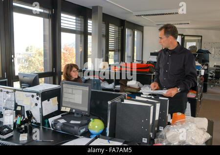 Coldrerio, Switzerland - 21 october 2002: People working at the office of Hugo Boss industry at Coldrerio on the italian part of Stock Photo