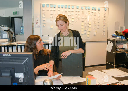 Coldrerio, Switzerland - 21 october 2002: People working at the office of Hugo Boss industry at Coldrerio on the italian part of Stock Photo