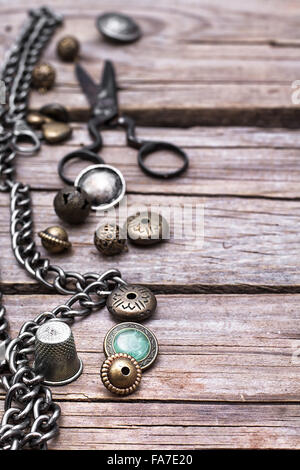 Retro scissors,beads for handicraft and iron chain Stock Photo