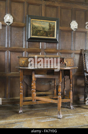 A 16th century virginal showing a detail of the inscription (and date of 1537) over the keyboard, in the Music Room at Westwood Manor, Wiltshire. Stock Photo