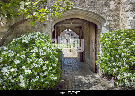 Looking to the cottages from the courtyard at Ightham Mote, Kent Stock Photo