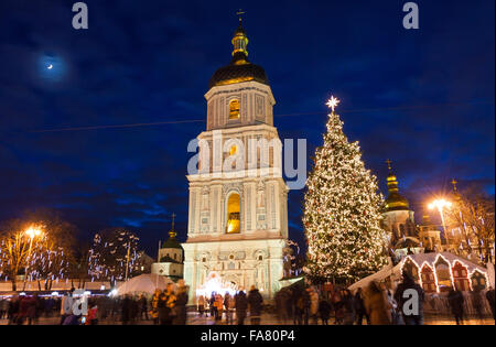 Christmas market on Sophia Square in Kyiv, Ukraine. Main Kyiv's New Year tree and Saint Sophia Cathedral on the background Stock Photo