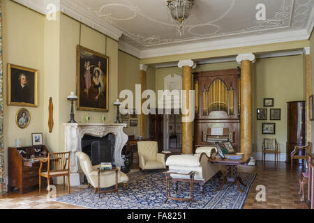 The Music Room at Killerton, Devon. Originally the dining room, this room takes its name from the chamber organ, which was built in 1807. Stock Photo