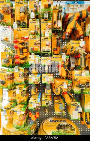 Hoselock garden hose accessories on a display stand for sale in a garden centre center Stock Photo