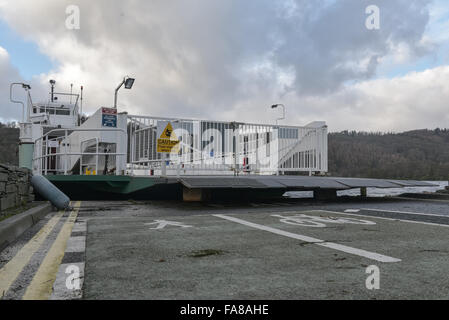 Cumbria, UK. 23rd December, 2015. Although the ferry can move from one side to another, it cannot let vehicles board due to the ramp being a foot higher than the road. This means a 20 minute diversion for vehicles around the lake. Credit:  Michael Scott/Alamy Live News Stock Photo