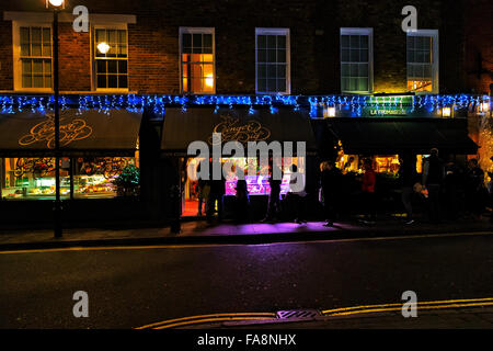 London, UK. 23rd December, 2015. Customers queue for Christmas orders. Ginger Pig butchers, Moxon street, Marylebone, London W1, England, UK Credit:  Keith Erskine/Alamy Live News Stock Photo