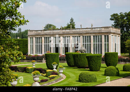 The Orangery and Italian Garden in July at Belton House, Lincolnshire. The Orangery was designed by Wyatville and built in 1819. Stock Photo