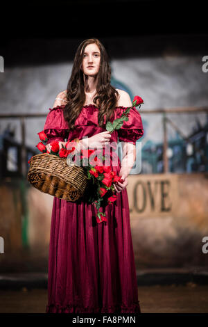 Secondary school teenage students pupils in a schools performance of  the musical 'Oliver!' based on the story Oliver Twist by Charles Dickens Stock Photo