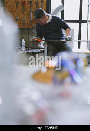 Japanese glass artisan working in the studio Stock Photo