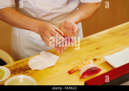 Japanese sushi chef working Stock Photo