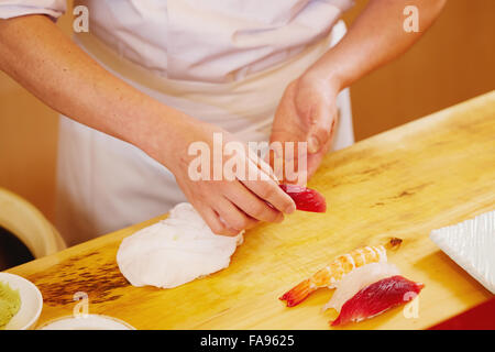 Japanese sushi chef working Stock Photo