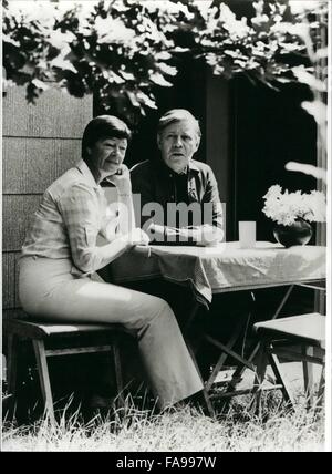 1972 - West German Chancellor Helmut Schmidt At Vacation: He really earned his vacation... after exhausting discussions about the reduction of the West German budget. So West German chancellor Helmut Schmidt went like every year to the Brahmsee at Schleswig-Holstein, where he owns a holiday-house. Photo Shows Helmut Schmidt with his wife Hannelore (''Loki'') in front of their holiday-house. (Credit Image: © Keystone Pictures USA/ZUMAPRESS.com) Stock Photo